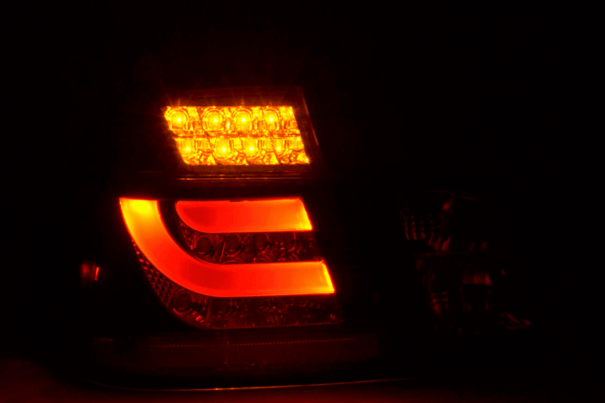 BMW 3-series E46 sedan black clear LED tail lights set by K2 Industries, for models 1998-2001, shown on vehicle.