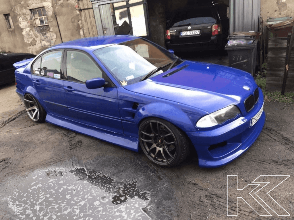 BMW 3-Series E46 sedan over fender kit with vented front fenders by K2 Industries, available in ABS or fiberglass for enhanced style.