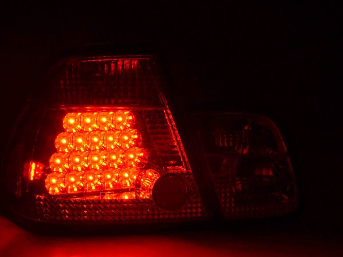 BMW 3-series E46 sedan red Altezza style tail lights set by K2 Industries, pre-facelift 1998-2001, installed on rear of vehicle.