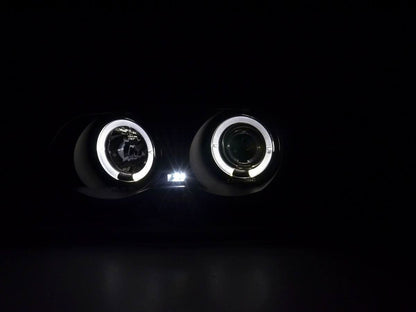 BMW 3-series E46 sedan/touring black angel eyes headlights set by K2 Industries, for 1998-2001 models, with clear lens and black housing.