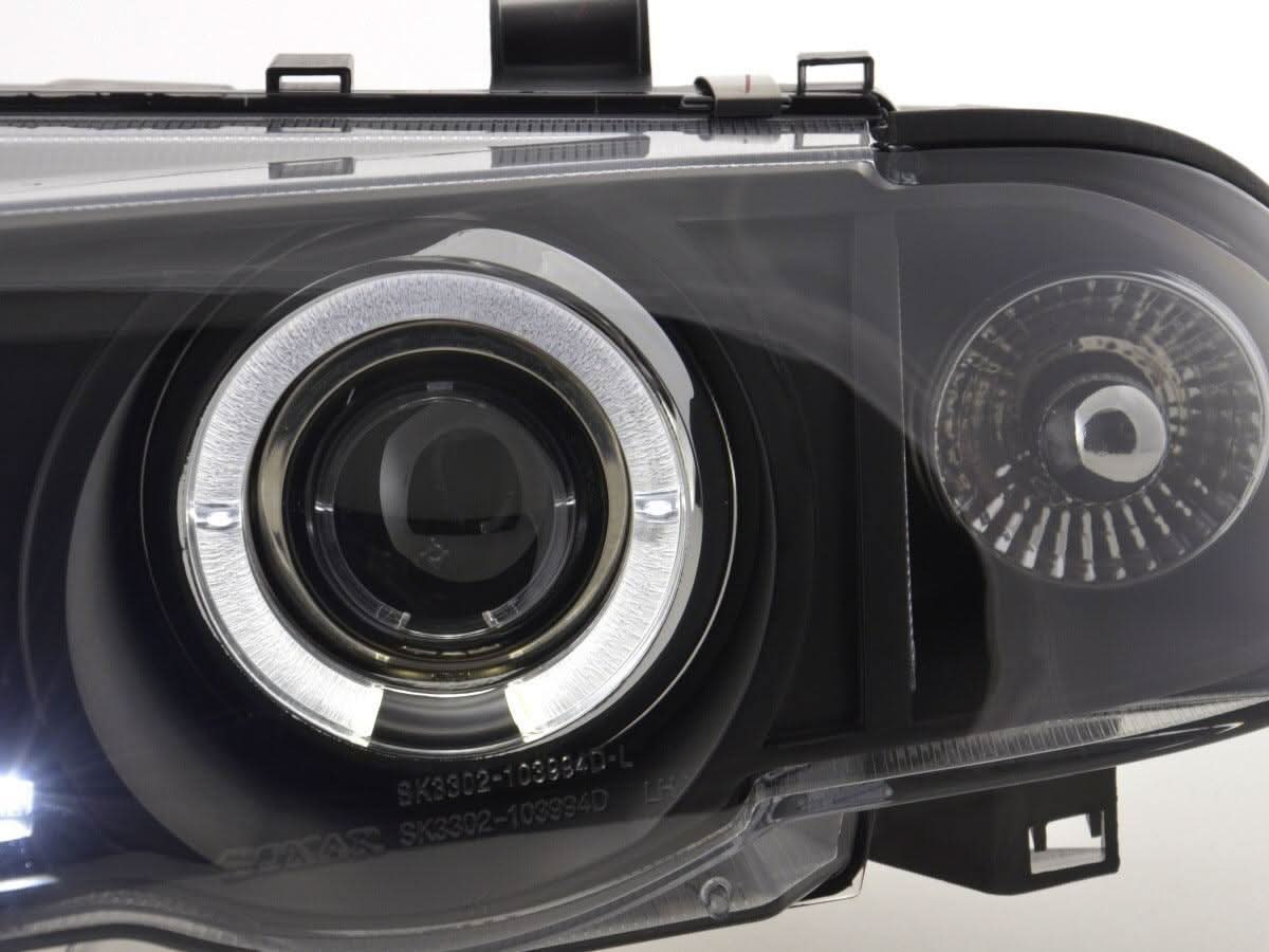 BMW 3-series E46 Sedan/Touring black angel eyes headlights set by K2 Industries, for 1998-2001 models, featuring sleek design and dual halo rings.