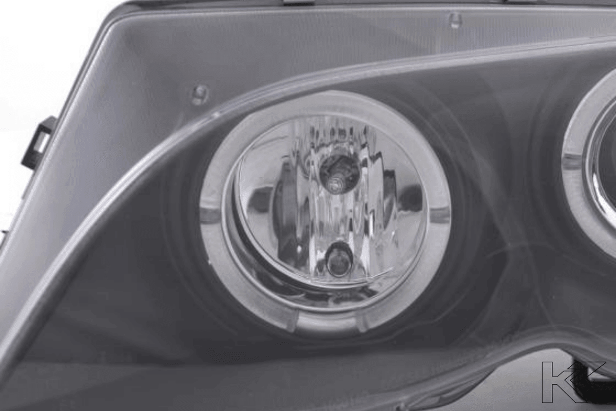 BMW 3-series E46 Sedan/Touring black angel eyes headlights set by K2 Industries, for 2002-2005 models, with clear lens and black housing.