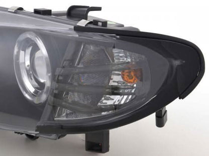BMW 3-series E46 sedan/touring black angel eyes headlights set by K2 Industries, featuring sleek design for 2002-2005 models.