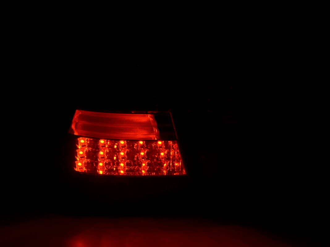 BMW 3-series E46 wagon smoked LED tail lights set by K2 Industries, rear view showing sleek tinted taillight design.