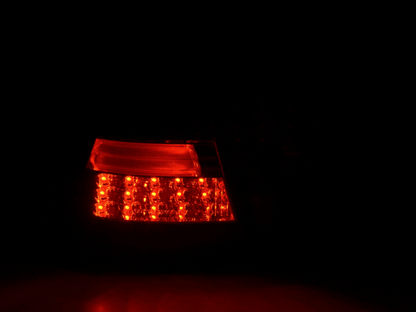 BMW 3-series E46 wagon smoked LED tail lights set by K2 Industries, rear view showing sleek tinted taillight design.