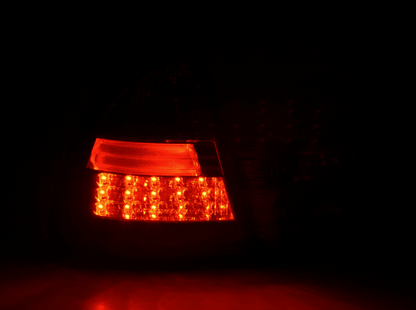 K2 Industries smoked LED tail light set for BMW 3-series E46 wagon/touring (1999-2005), showing dark tinted taillights with LED details.