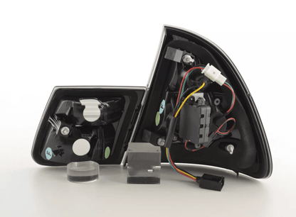 Smoked LED taillights set for BMW 3-series E46 Wagon/Touring (1999-2005) by K2 Industries, showing the sleek, smoked lens design.
