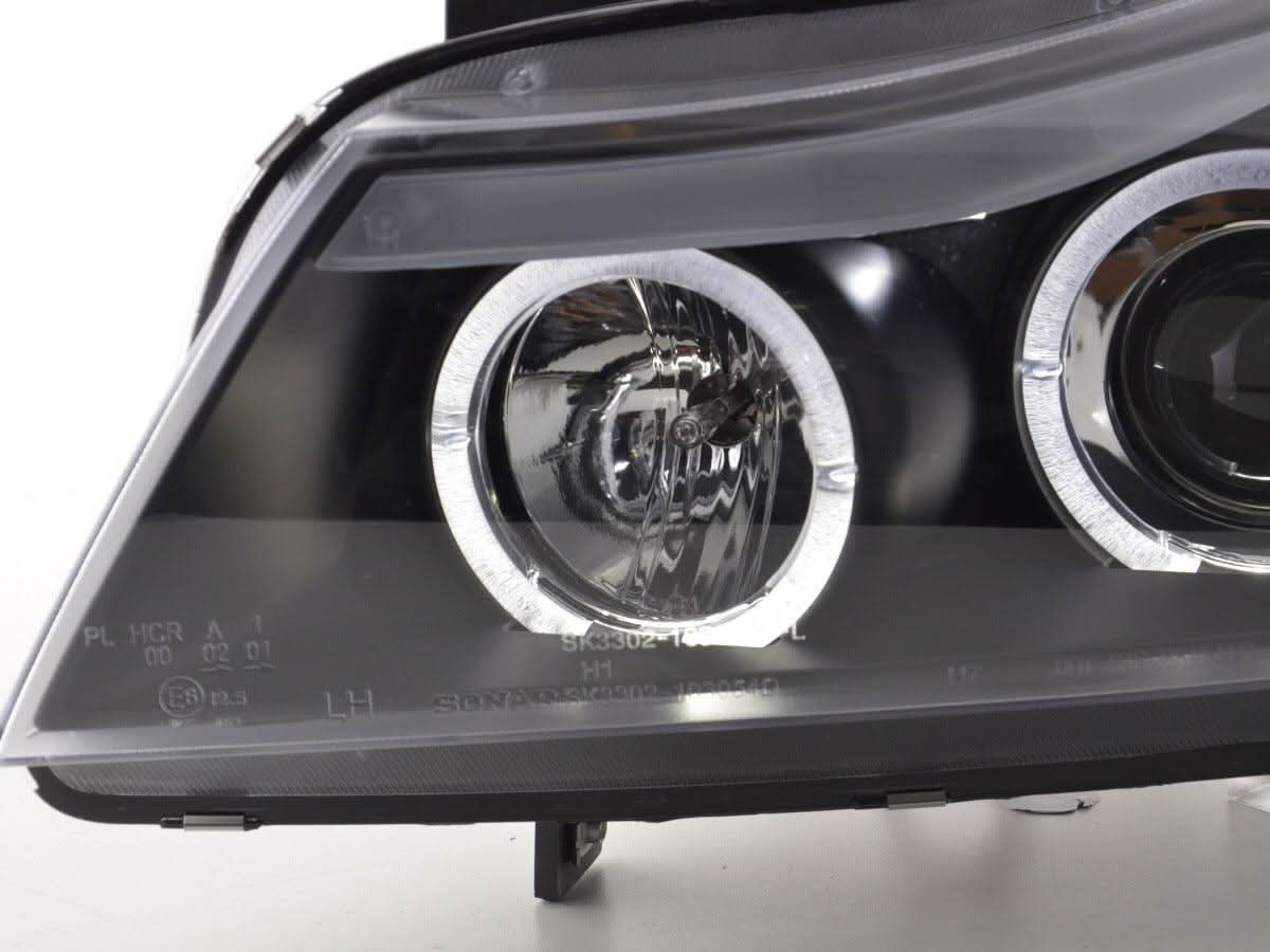 BMW 3-series E90 E91 black angel eyes LED headlights set by K2 Industries for 2005-2012 models, showing the headlight assembly with LED rings.