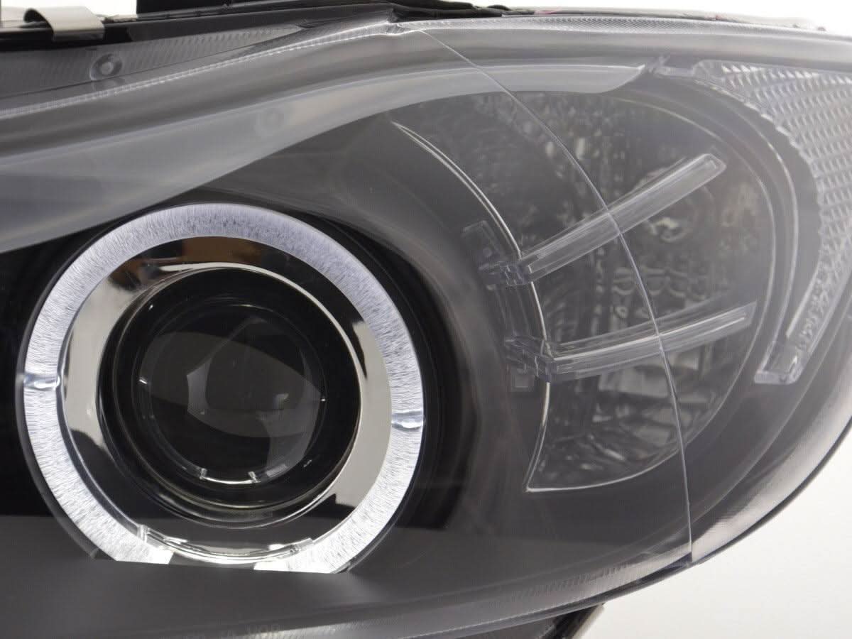 BMW 3-series E90 E91 LED headlight set with black angel eyes by K2 Industries for 2005-2012 models, showing the headlights installed.