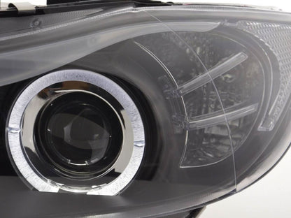 BMW 3-series E90 E91 LED headlight set with black angel eyes by K2 Industries for 2005-2012 models, showing the headlights installed.