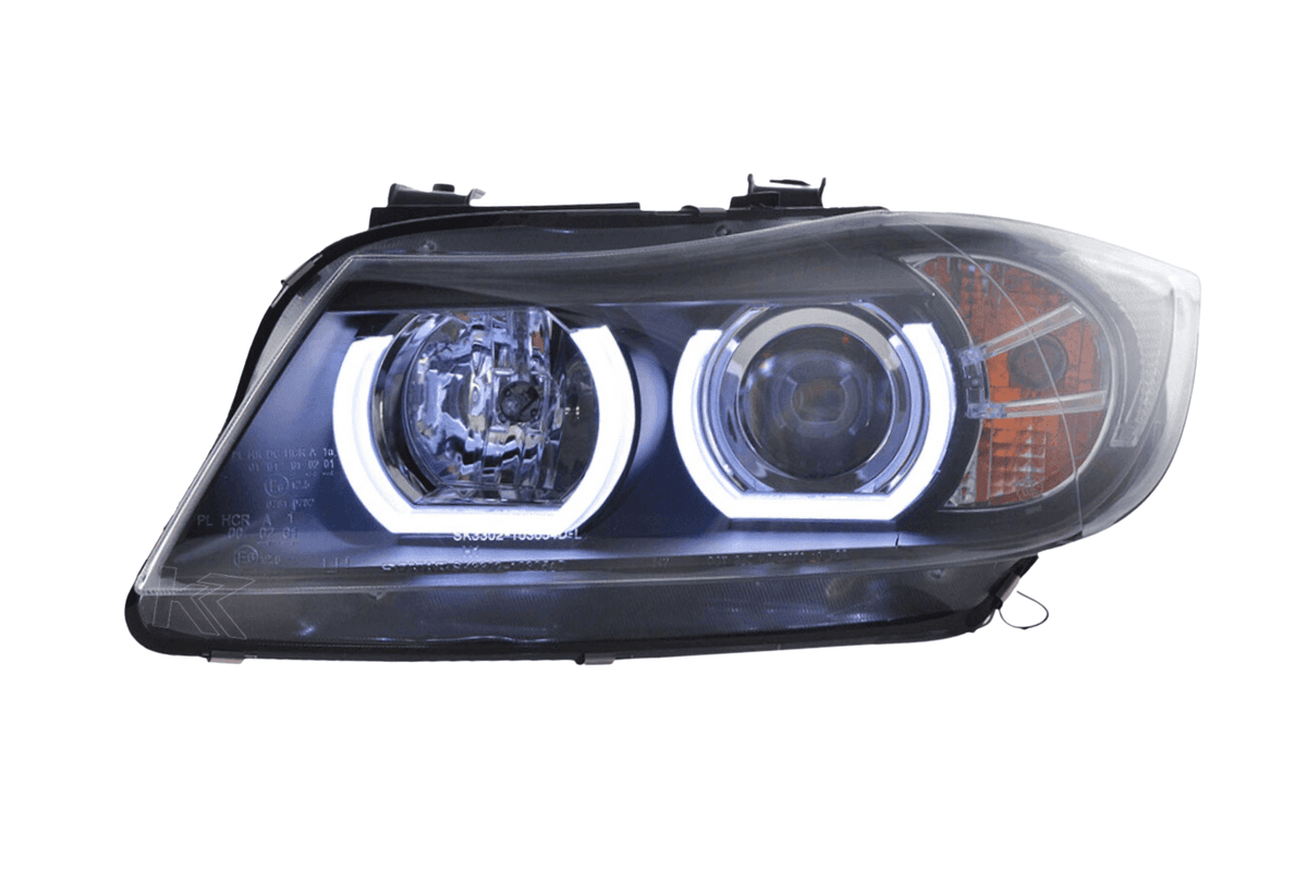 BMW 3 Series E90/E91 black LED U-bar headlights by K2 Industries, for models 2005-2012, showing front view with LED U-bars illuminated