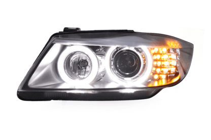 BMW 3 Series E90 OE style headlights by K2 Industries, suitable for 2005-2012 model, showing the front view with clear lens and design.