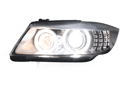 Pair of BMW 3 Series E90 OE style headlights by K2 Industries for 2005-2012 models with clear lenses and modern design.