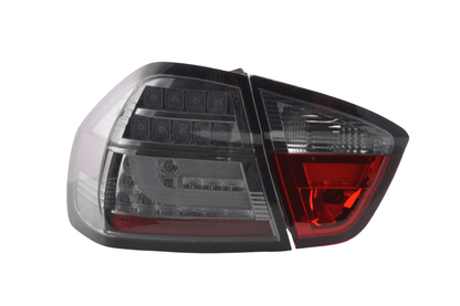 BMW 3-Series E90 sedan chrome and smoked LED bar tail lights by K2 Industries, for models 2005-2008, showing rear view.