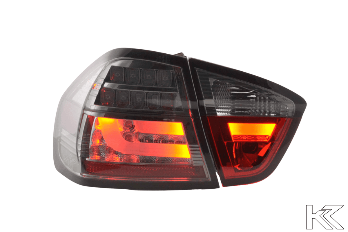 BMW 3-Series E90 sedan tail lights with chrome and smoked LED bar design, compatible with 2005-2008 models by K2 Industries.