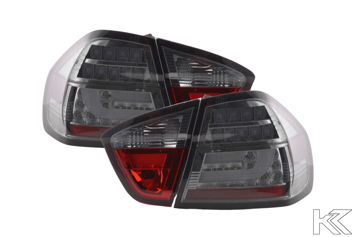 BMW 3-Series E90 sedan chrome and smoked LED bar taillights by K2 Industries, 2005-2008 model, showing close-up of tail light design.