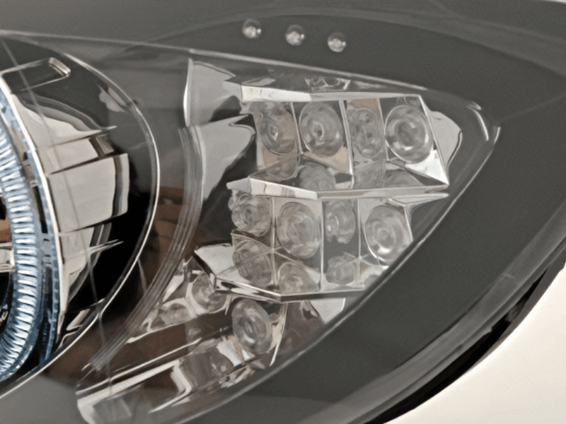 BMW 3-Series E90/E91 black angel eyes headlights by K2 Industries, showing the sleek headlights with distinctive angel eye rings.