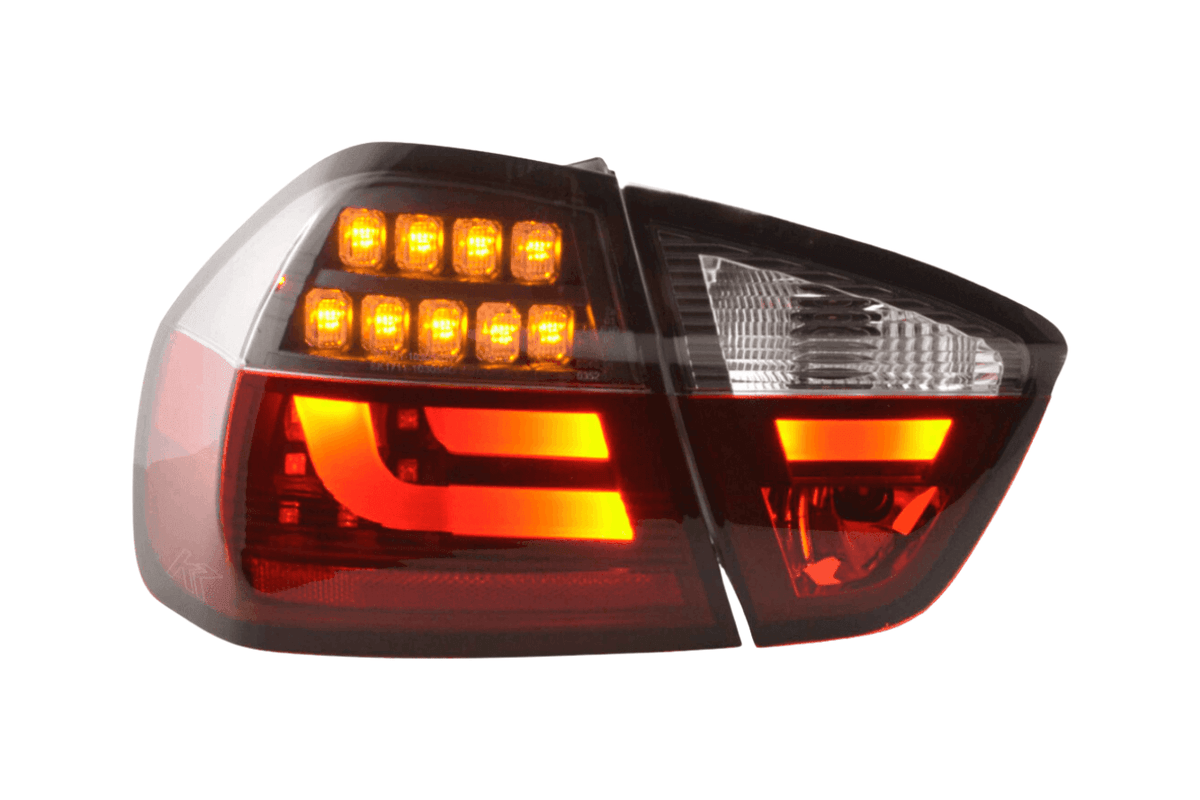 BMW 3-Series E90 sedan red and black LED taillights by K2 Industries, showing the sleek tail light design for 2005-2008 models.