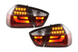 BMW 3-Series E90 sedan red and black LED taillights by K2 Industries, for models 2005-2008, showing close-up of tail light design.