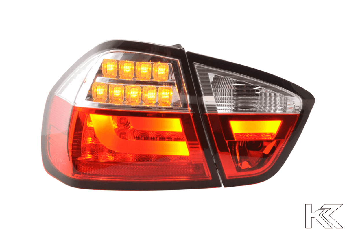 BMW 3-Series E90 sedan tail lights with red and clear LED bar design by K2 Industries, for 2005-2008 models.