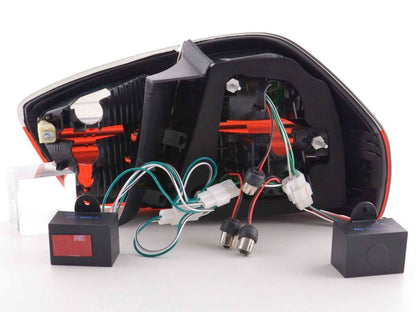 BMW 3-series E90 sedan red and smoke Euro LED taillights set by K2 Industries, designed for 2005-2008 models.
