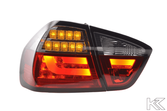 BMW 3-Series E90 sedan red smoked LED bar tail lights by K2 Industries, for 2005-2008 models, showing the sleek taillight design.