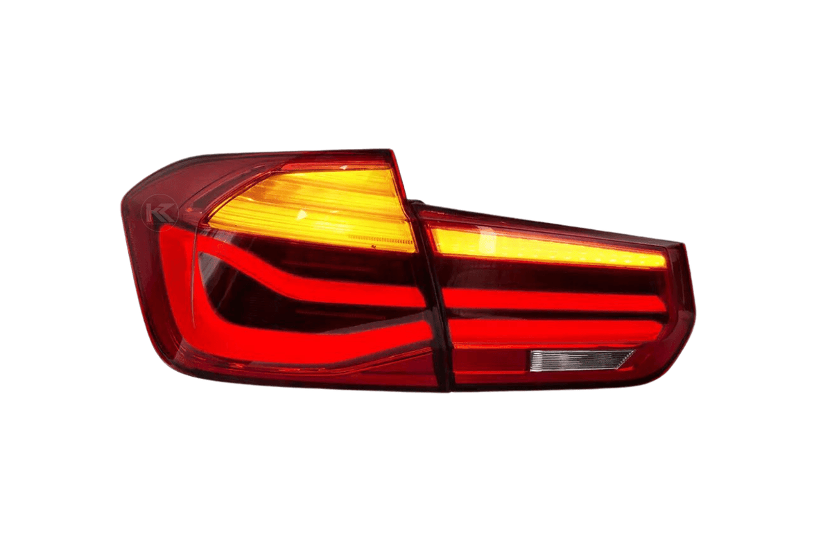 BMW 3-Series F30 F35 F80 6th gen LCI style LED tail lights upgrade by K2 Industries, showing red and clear lens design.