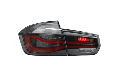 BMW 3-Series F30 F35 F80 6th Gen LED tail lights upgrade by K2 Industries, showcasing sleek red and clear lens design.