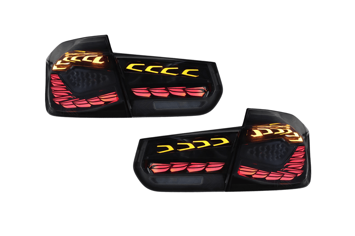BMW 3 Series F30 F35 F80 tail lights with black dragon scale LED design, installed on a 2012-2019 model, by K2 Industries.