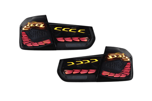BMW 3 Series F30 F35 F80 tail lights with black dragon scale LED design, installed on a 2012-2019 model, by K2 Industries.