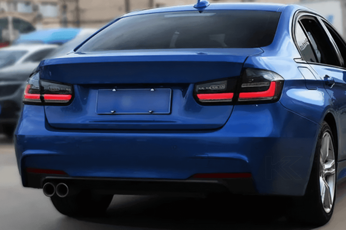 BMW 3 Series F30 F35 F80 modernized LED tail lights by K2 Industries, showing sleek design and illuminated brake and indicator lights.