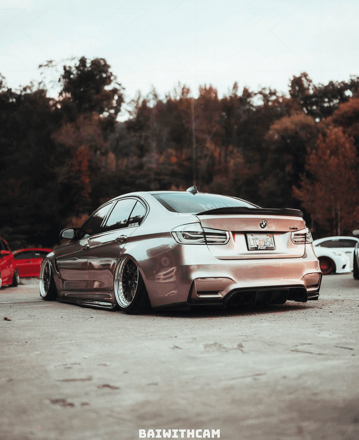 BMW 3-Series F30/F80 clear tail lights by K2 Industries, installed on a 2011-2020 model, showing sleek LED design and bright illumination.
