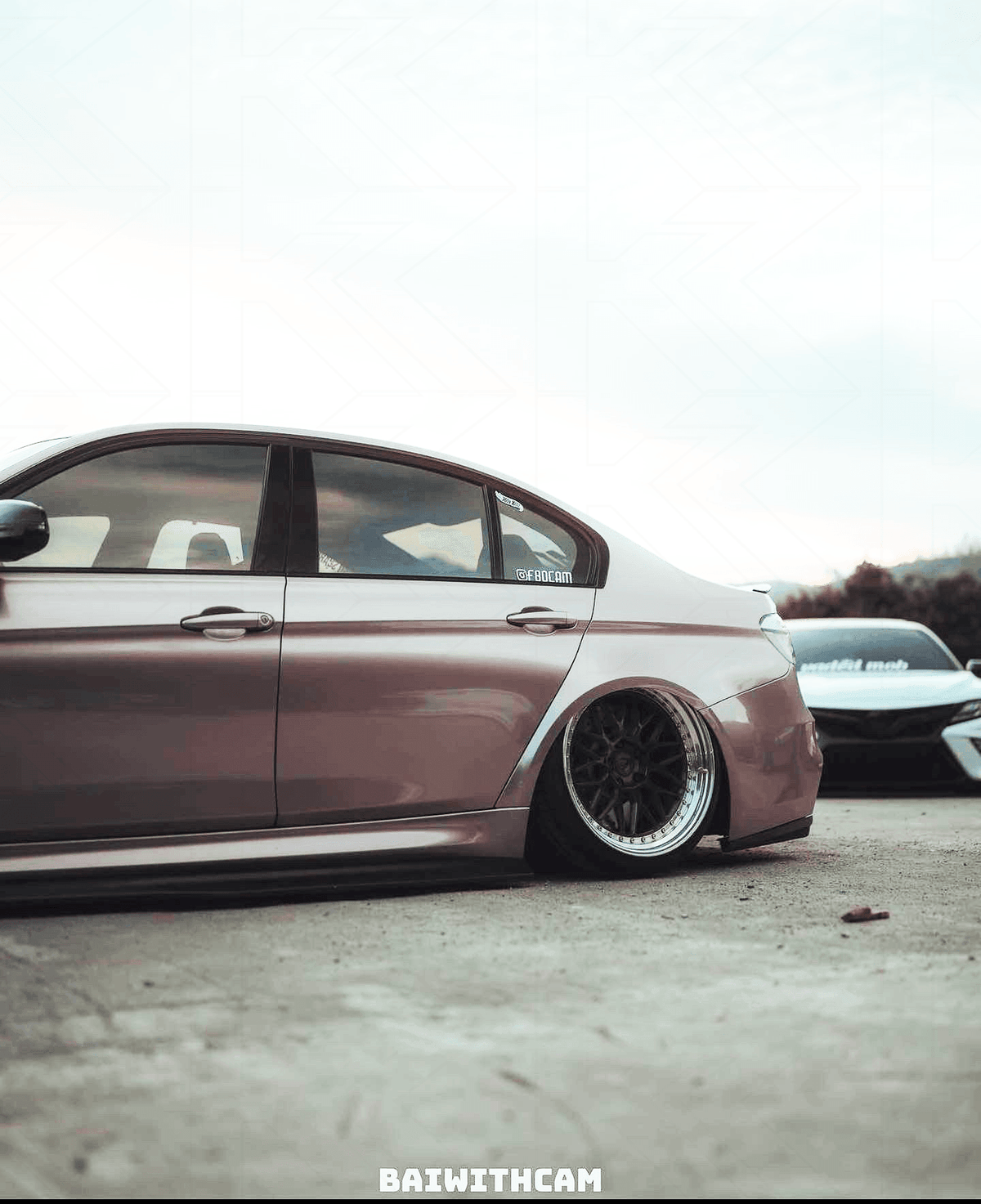 BMW 3-Series F30/F80 clear tail lights by K2 Industries showing sleek, transparent design installed on a 2011-2020 vehicle.
