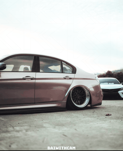BMW 3-Series F30/F80 clear tail lights by K2 Industries showing sleek, transparent design installed on a 2011-2020 vehicle.