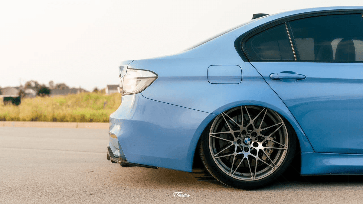 BMW 3-Series F30/F80 clear tail lights by K2 Industries, showing sleek transparent design for models 2011-2020.