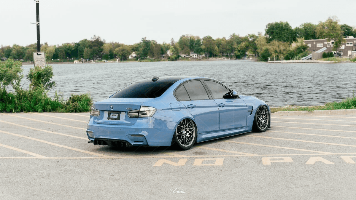 BMW 3-Series F30/F80 clear tail lights by K2 Industries, showing sleek transparent design for 2011-2020 models.