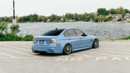 BMW 3-Series F30/F80 clear tail lights by K2 Industries, showing sleek transparent design for 2011-2020 models.