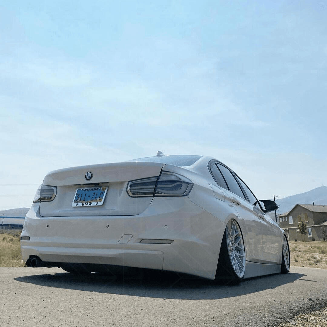 BMW 3-Series F30/F80 clear tail lights by K2 Industries, showing sleek, modern design for 2011-2020 BMW 3-Series models.