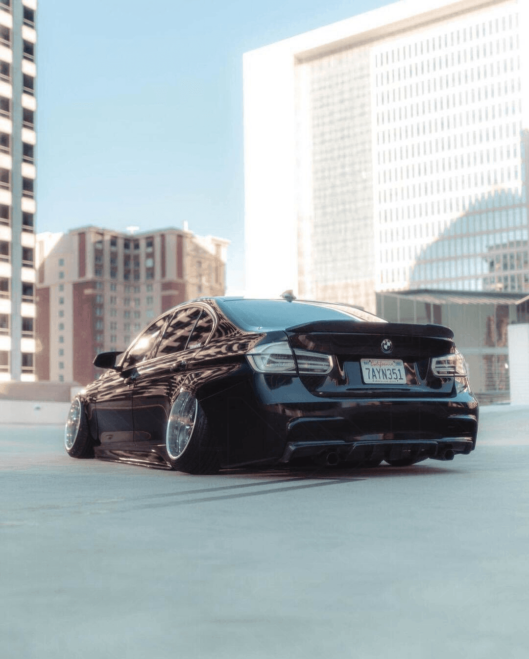 BMW 3-Series F30/F80 clear tail lights by K2 Industries, showing sleek, transparent vehicle rear lights for 2011-2020 models.