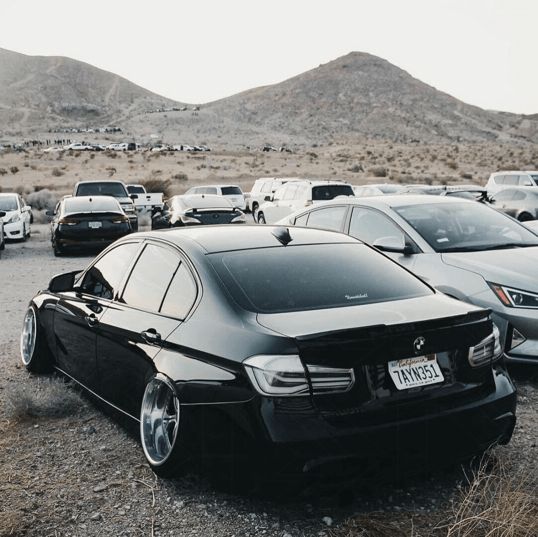 BMW 3-Series F30/F80 clear tail lights by K2 Industries, showing sleek transparent design for 2011-2020 models.