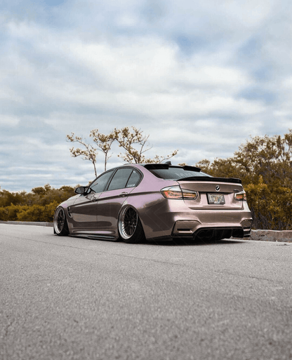 BMW 3-Series F30/F80 clear tail lights by K2 Industries, showing sleek, transparent design for 2011-2020 models.