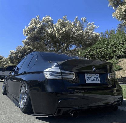 BMW 3-Series F30/F80 clear tail lights by K2 Industries, showing sleek, transparent design for 2011-2020 models.