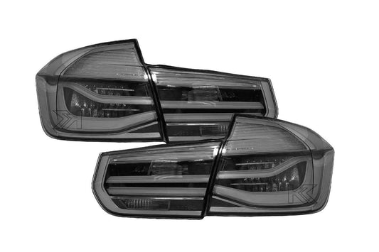 BMW 3-Series F30 F80 clear tail lights by K2 Industries, showing sleek, modern design with transparent lenses for model years 2011-2020.