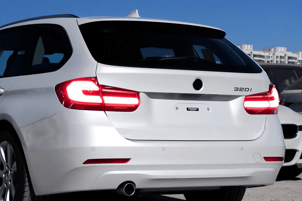 BMW 3 Series F31 modern black line LED tail light upgrade by K2 Industries, rear view showing sleek black accents and LED design.