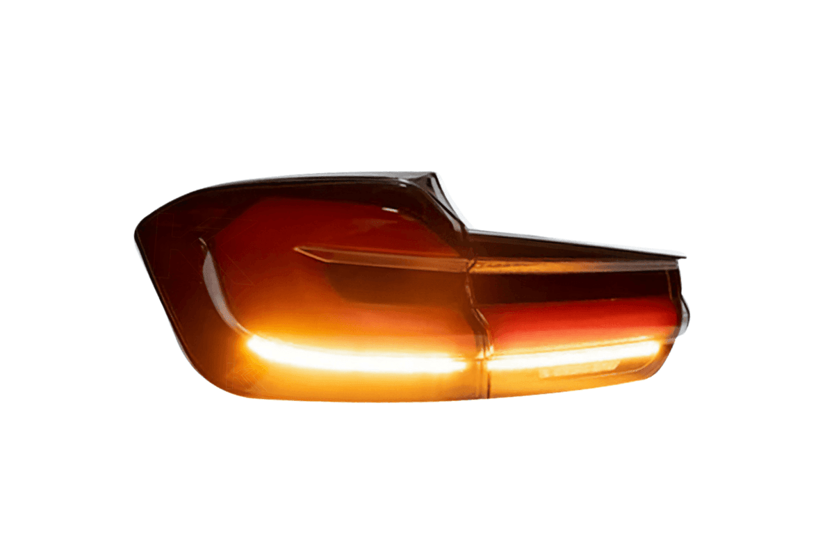 BMW 3 Series F31 modern black line LED tail light upgrade by K2 Industries, rear view showing sleek black design and LED lighting.