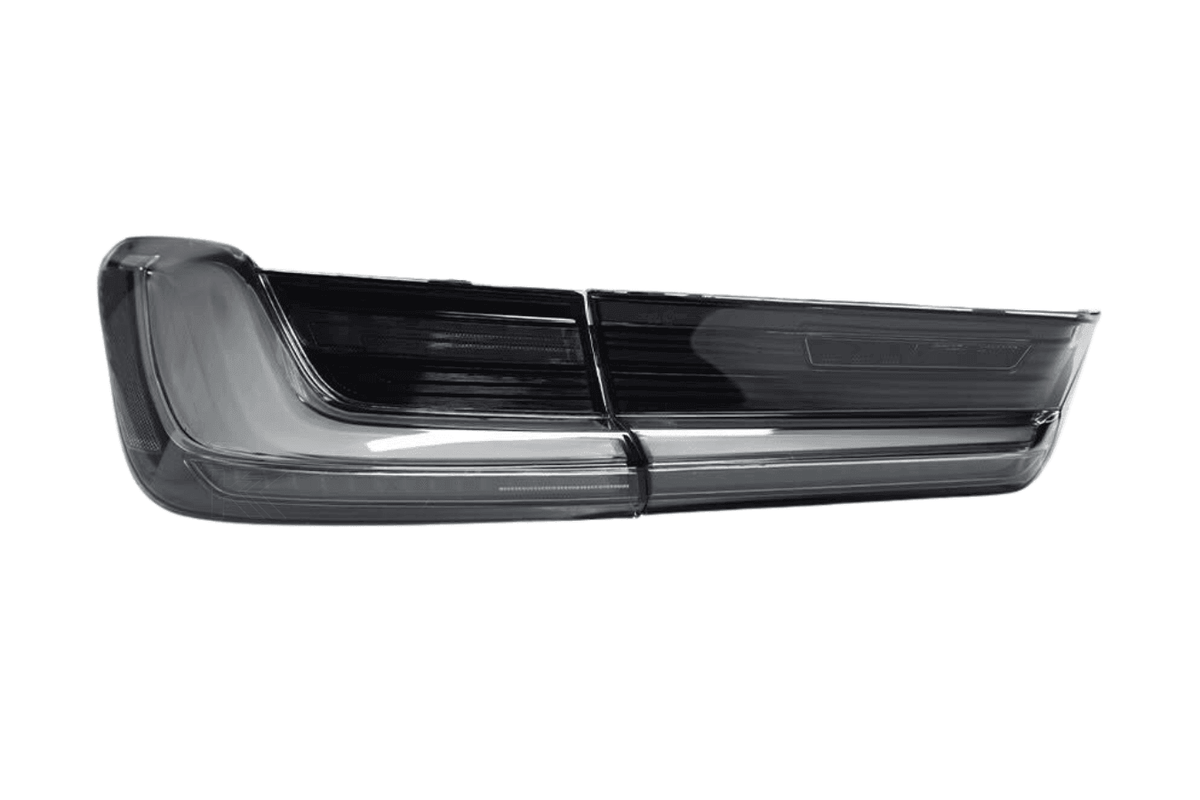 BMW 3 Series G20 G28 G80 M3 OEM style clear LED tail lights by K2 Industries, showing sleek, modern design on the vehicle.