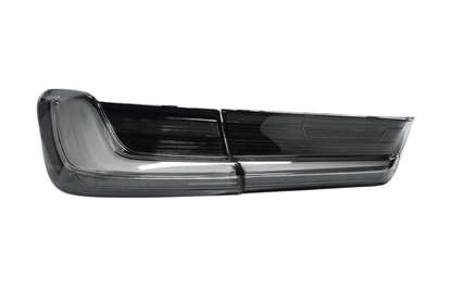 BMW 3 Series G20 G28 G80 M3 OEM style clear LED tail lights by K2 Industries, showing sleek, modern design on the vehicle.