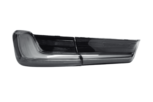 BMW 3 Series G20 G28 G80 M3 OEM style clear LED tail lights by K2 Industries, showing sleek, modern design on the vehicle.