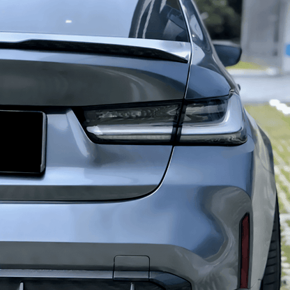 BMW 3 Series G20 G28 G80 M3 OEM style clear LED tail lights by K2 Industries, showing sleek design and bright LED illumination.