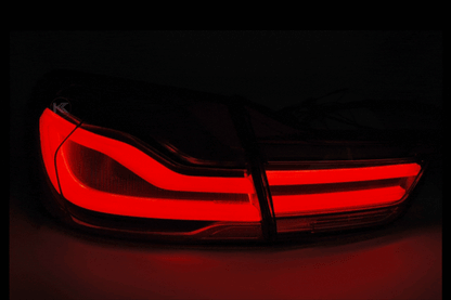 BMW 4-Series F32/F82 and F33 F35 clear LED tail lights by K2 Industries installed on a 2013-2016 model.